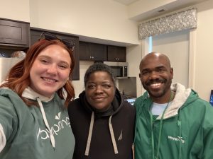 Kareem (member) with his engagement specialists, Dan and Lindsey.